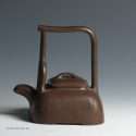 Dark brown Yixing Inscribed teapot