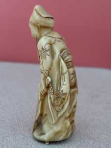 3 Photo small man carving. 1
