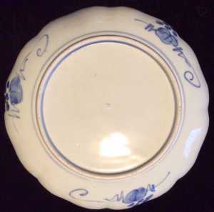 antique blue and white arita dish foot.