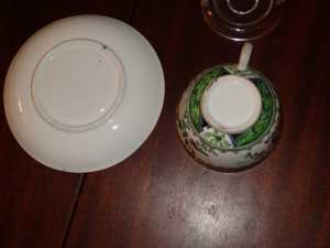 antique famille verte tea cup and saucer bottom